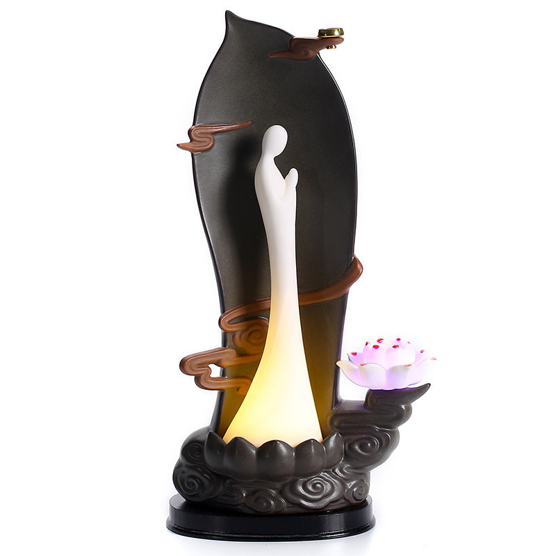 Creative Tea Pet Backflow Fragrance Home Boutique HomeProduct Details:
 
 Material: purple sand
 
 Color classification: 


 1 style: Jinglian Tianxiang LED backflow incense ornaments USB plug
 
 2 styles: Jinglian TianCreative Tea Pet Backflow Fragrance Home Boutique Home